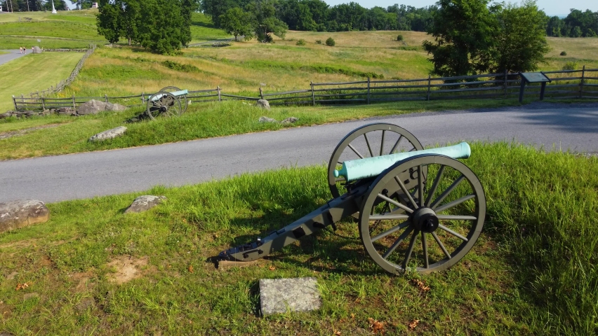 Cannon and the battlefield at Gettsyburg, an aerial drone that covers