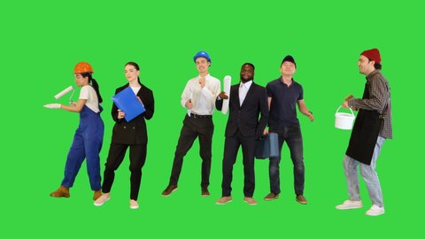 Crowd or group of different people dancing on a Green Screen, Chroma Key.