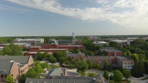 Ames , Iowa , United States - 06 12 2021: Aerial Establishing Shot of Marston Water Tower on Iowa State University Campus in Summer