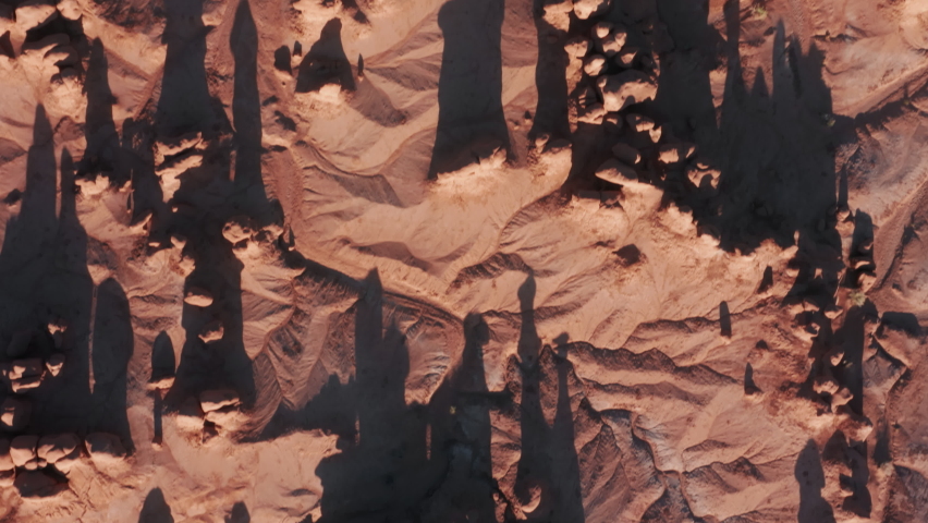 Top down view from satellite flying over red Mars planet surface. Cinematic space travel or colonization 4K footage. Landscape mission science and space cosmos galaxy exploration in Universe and space