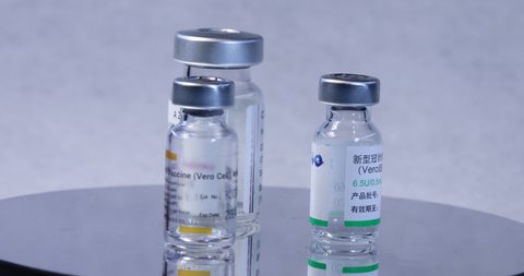 Mahasarakham, Thailand - 15 July 2021 : Used Sinovac vaccine bottle and AstraZeneca vaccine bottle and Sinopharm vaccine bottle