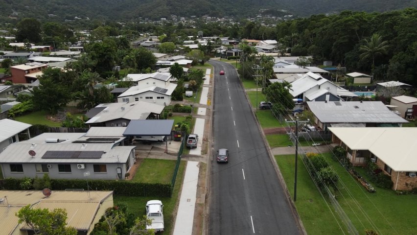 Drone following a car through the amazing landscape of Cairns, Queensland.