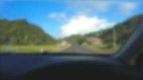 Defocused abstract background of travel in the car dashboard.
