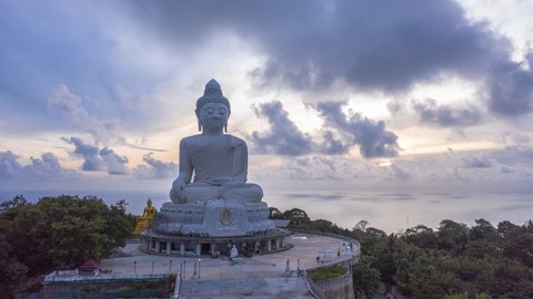 Shaking while taking pictures Hyperlapse clouds moving above Phuket big Buddha. aerial photography clouds moving above Phuket big Buddha in sunset.
