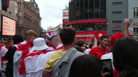 London, UK - July 11 2021: Crowd of England fans in Leicester Square before the Euro 2020 England v Italy Final