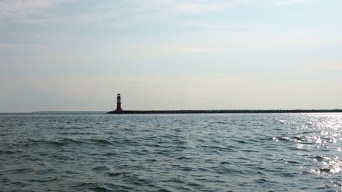 Lighthouse of Warnemuende and coastline of baltic sea in Rostock