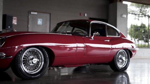 Heredia , Heredia , Costa Rica - 11 10 2020: jaguar E-Type antique english car jagaur red on display
