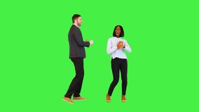 Cheerful colleagues in formal clothes dance Happy funny business man and woman celebrating victory on a Green Screen, Chroma Key. - Powered by Shutterstock - Get 15% off with code: PIKWIZARD15