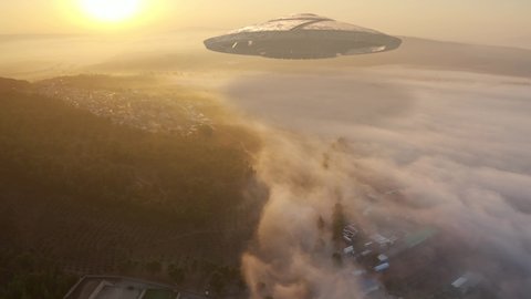 ufo's Armada fleet heading toward mother ship,aerial view 
drone view from Golan Heights Israel, Alien concept

