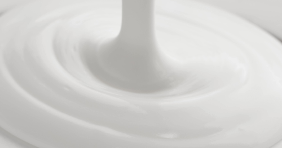 Whipped White Egg-Sugar Cream Close-up. Royalty-Free Stock Footage #1075978829