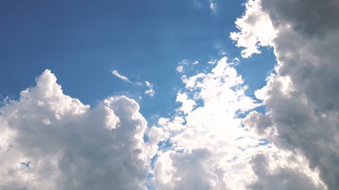 Time lapse clip of white fluffy clouds over blue sky. Sky clouds timelapse. 