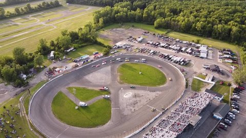 Aerial View Of Stock Car Racing Competition At Flat Rock Speedway In Monroe County, Michigan, USA. 