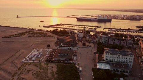Rostock, Germany - Juli 12, 2020: lighthouse in Warnemuende Rostock. aerial view from the drone. Aerial view from the drone. view from above to rostock warnemuende with arriving ferry Stena Line
