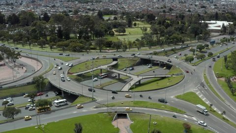 Traffic at roundabout in Bogota Colombia. Aerial drone view video 4K.