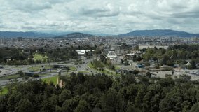 Engativa district in Bogotá Colombia. Aerial drone view from Parque Metropolitano Simón Bolívar. 4K video.