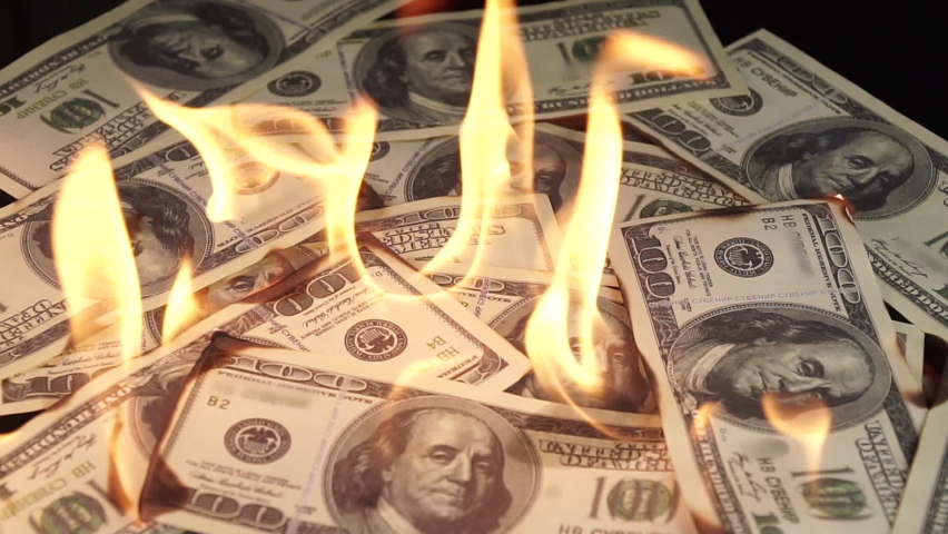 Slow motion of dollars money on fire lost money. Financial disaster concept | Shutterstock HD Video #1076025398