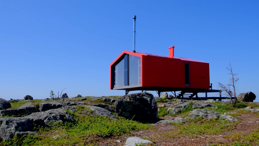 A very beautiful and cozy dubldom for tourists on the top of a mountain with beautiful views of the neighboring mountains and lakes and the sea with islands on the horizon.