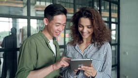 Gen z millennial teenagers Asian guy and latin Hispanic girl using mobile cell phone applications. Diverse high school students testing startup business develop project. Collaborate diversity concept. - Powered by Shutterstock - Get 15% off with code: PIKWIZARD15