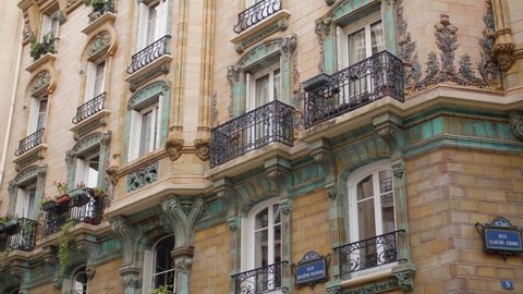 Les Chardons Building On Rue Claude Chahu. Elegant Art Nouveau Facade With Ceramic Exterior Wall In 16th Arrondissement Of Paris In France. cropped shot, slider right