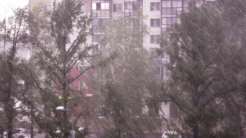 Heavy Downpour 250Fps Slow Motion. Heavy rain camera in motion. City background.