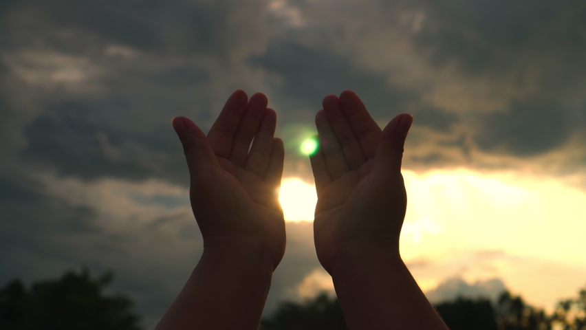 B roll 4k. of Human hands open palm up worship god with sunset like hope. Eucharist Therapy Bless God Helping Repent Catholic Easter Lent Mind Pray. Christian Religion concept background. Victory god. Royalty-Free Stock Footage #1076074802