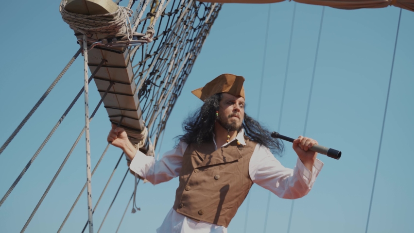 Portrait of man in a pirate costume on a pirate ship Royalty-Free Stock Footage #1076083742