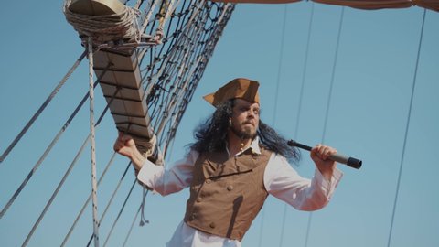 Portrait of man in a pirate costume on a pirate ship