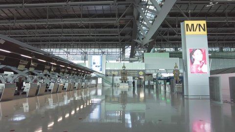 Bangkok, Thailand on July 17,2021 4K footage walking shot of quite atmosphere at Suvarnabhumi international airport which had no tourist and traffic.it is the effect from 