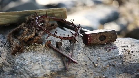 Close-up of the crown of thorns, a hammer, nails and rope when the Lord Jesus was crucified
