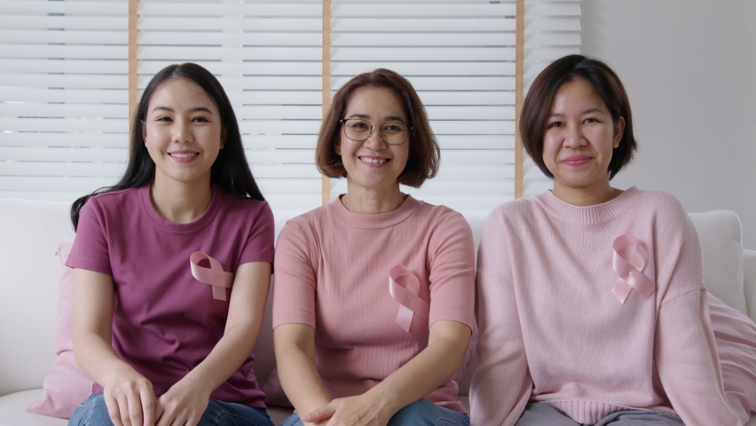 Diversity group asia happy people or senior mature lady and teen girl sit at home sofa smile look at camera to help fight prevent or protect female disease issue relief, patient health care benefit. Royalty-Free Stock Footage #1076110820