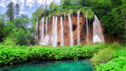 Seamless Loop Cinemagraph video of waterfall landscape in Plitvice Lakes Croatia in springtime . Tranquil nature scenery for relaxation background .