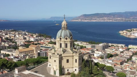 Messina city in Sicily, Italy. Drone aerial view of Sacrario di Cristo Re which faces the region of Calabria.