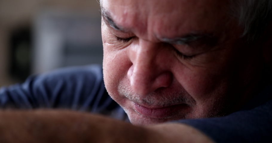 Depressed older man crying. Person in crisis. Middle-aged senior in despair | Shutterstock HD Video #1076156954