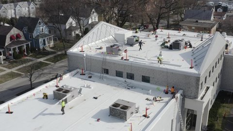 Aerial view of installation of a TPO flat roof