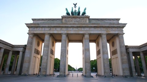 Brandenburger Tor Brandenburg Gate in Berlin with Quadriga statue on top, wide shot in the evening on a sunny day