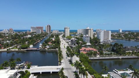 Fort Lauderdale Cityscape Skyline, Aerial View of Canals by Las Olas Boulevard, Beachfront Buildings on Sunny Day, Establishing Drone Shot, Florida USA