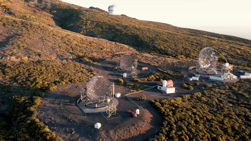 Aerial revealing shot of the Roque de Los Muchachos Observatory on La Palma, Canary Island, Spain with the view on the MAGIC (Major Atmospheric Gamma Imaging Cherenkov Telescopes)