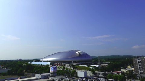 Sapporo hokkaido,Japan 2021 July 20   Time-lapse photography of Sapporo Dome at dawn with flowing clouds. Sapporo Dome is the venue for baseball and soccer in the Tokyo 2020 Olympic Games.