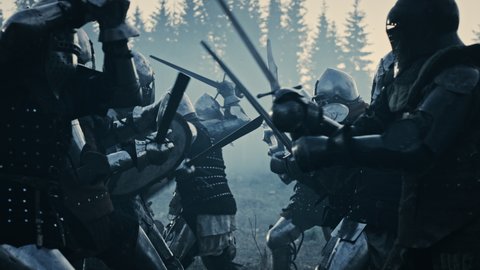 Epic Armies of Medieval Knights on Battlefield Clash, Armored Warriors Fighting Swords. Bloody War, Battle, Invasion. Dramatic Historical Reenactment. Cinematic Blue Light, Slow Motion, Medium
