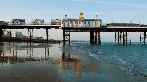 Wide view of the Eastbourne Pier in Eastbourne, East Sussex, England, a fashionable tourist seaside resort, east of Beachy Head