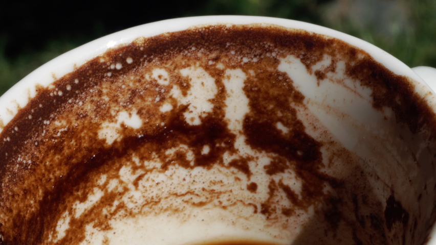 cup of Turkish coffee with grounds for fortune telling from the shapes
