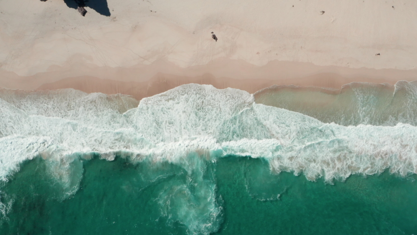 Ocean Waves On Sandy Shore Of Diaz Beach In Summer. - aerial