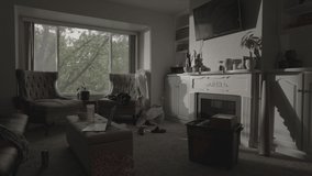 Time lapse of busy woman cleaning messy livingroom then resting  Provo, Utah, United States