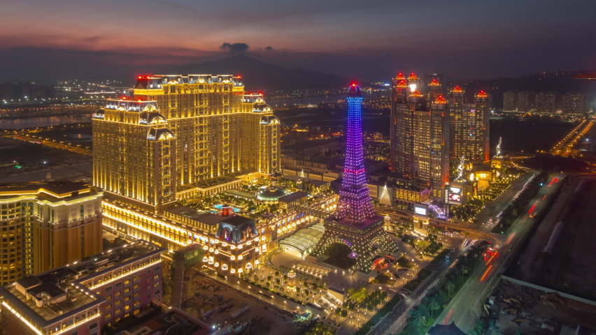 sunset night illuminated famous macau bay hotels rooftop panorama 4k timelapse china