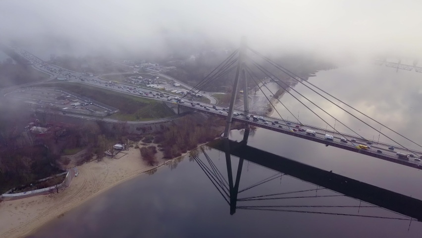 Aerial drone footage. North bridge in Kiev in the autumn fog.