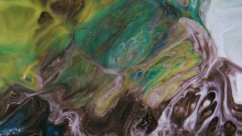 Pastel colors of paint stains. Abstract light pastel streams flow along the plane on a blue background. Marble texture. Fluid art. Liquid abstractions.