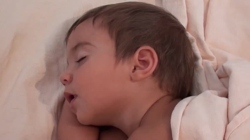 Face of cute toddler sleeping with open mouth
 | Shutterstock HD Video #10762433