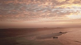Aerial Drone video of Sand Bank on the Maldives during sunset