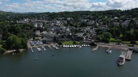 4K:  Drone Aerial Clip of Bowness on Windermere in the English Lake District, Cumbria, UK. Circular shot in Summer with Blue Sky. Stock Video Clip Footage