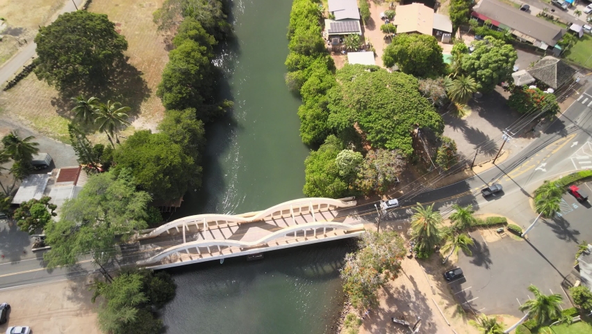 drone aerial panning view of the haleiwa bridge on oahu hawaii